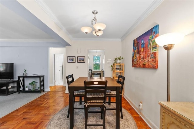 dining area featuring parquet floors, a chandelier, and ornamental molding