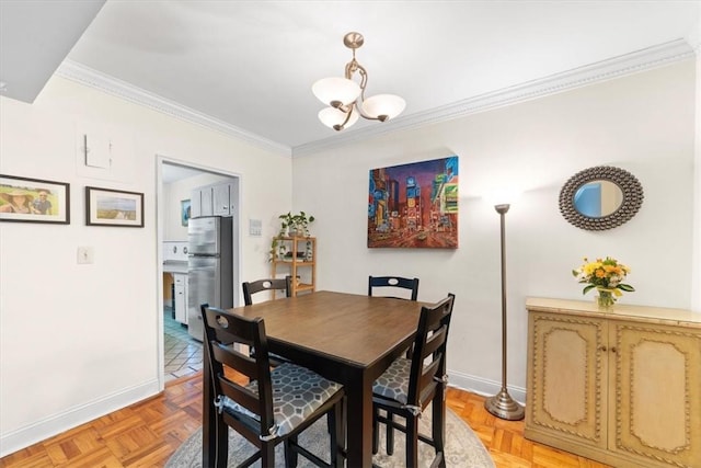 dining area featuring an inviting chandelier, ornamental molding, and light parquet flooring