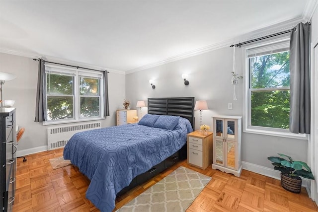 bedroom featuring crown molding, radiator, and light parquet flooring