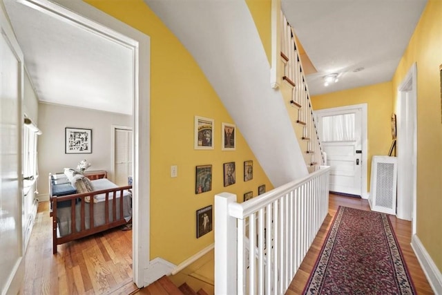 hall featuring hardwood / wood-style floors