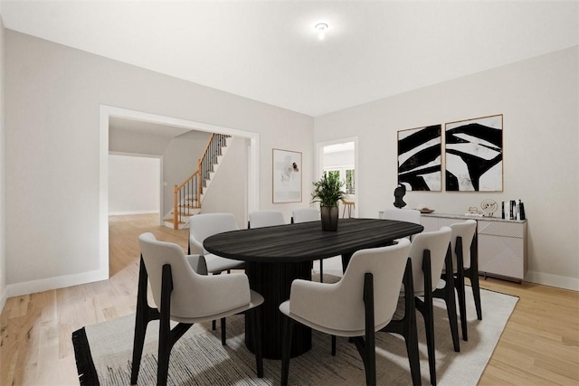 dining room with light hardwood / wood-style flooring