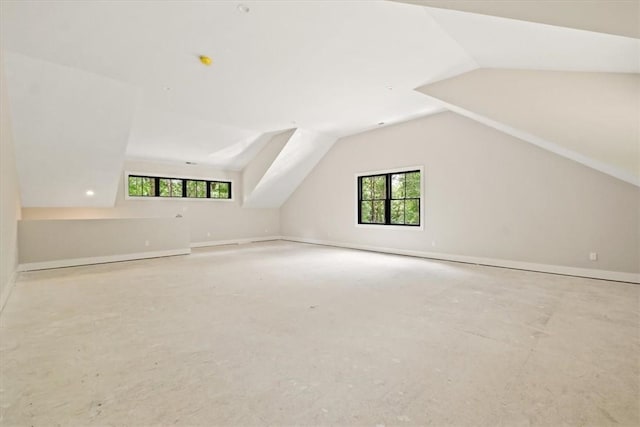 bonus room with vaulted ceiling