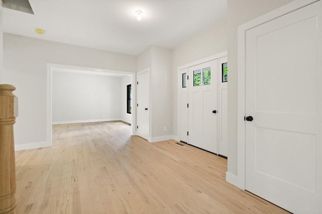 foyer entrance featuring light hardwood / wood-style flooring