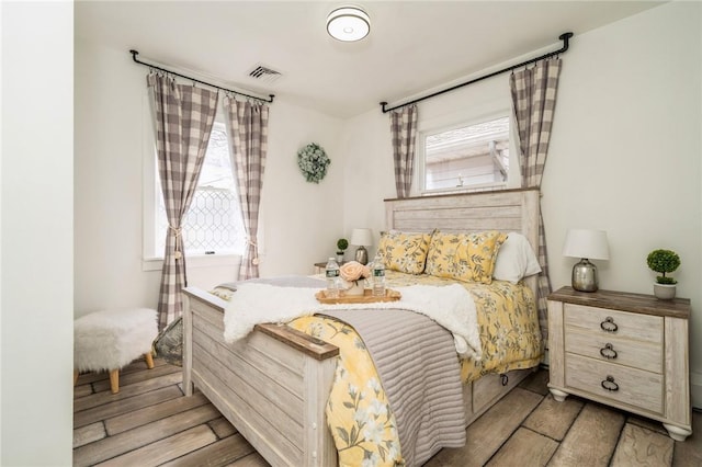 bedroom featuring light hardwood / wood-style floors