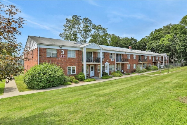 view of front of property with a front lawn