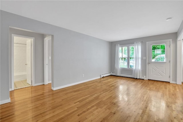 unfurnished room featuring light wood-type flooring