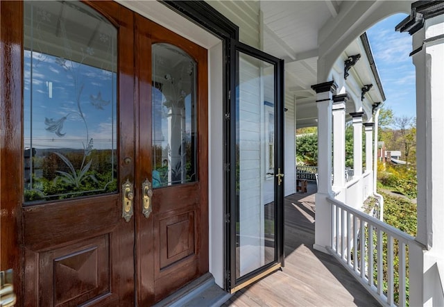 entrance to property featuring french doors