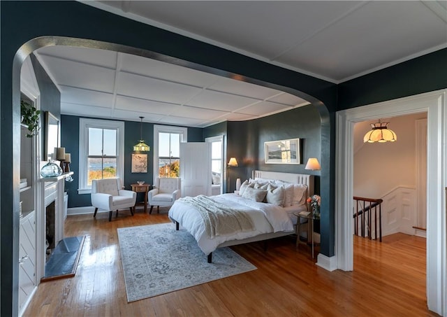 bedroom with wood-type flooring