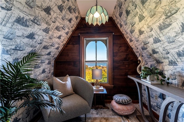 living area featuring vaulted ceiling