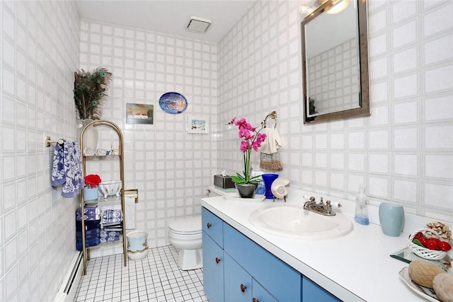 bathroom featuring vanity, a baseboard radiator, tile walls, tile patterned flooring, and toilet