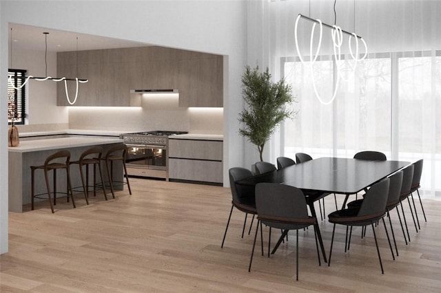 dining area with light wood-type flooring