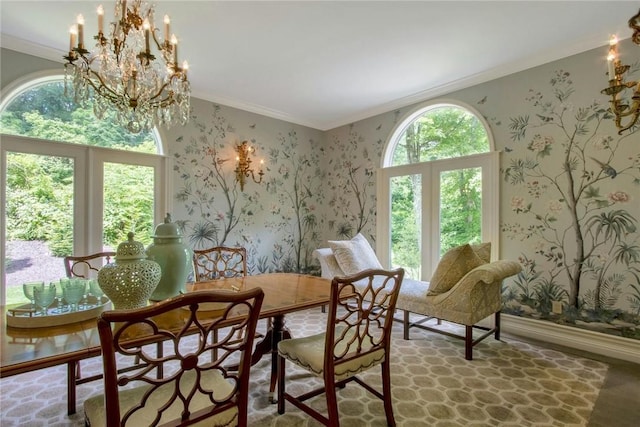 dining area featuring plenty of natural light and ornamental molding