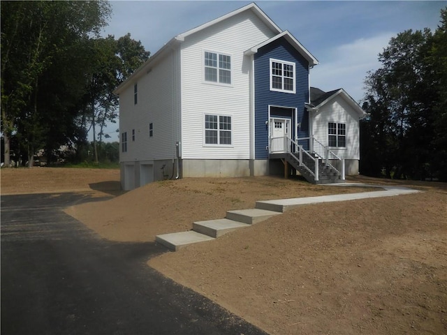 view of front of property featuring a garage