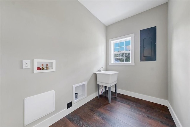 clothes washing area with dark hardwood / wood-style floors, hookup for a washing machine, and electric panel