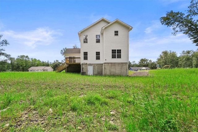 back of property with a deck