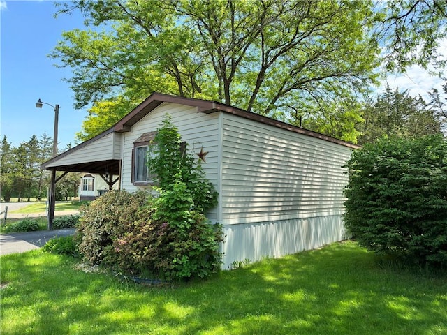 view of property exterior featuring a yard