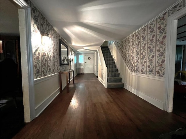 hall with dark hardwood / wood-style floors