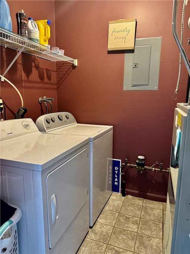 washroom with electric panel and independent washer and dryer