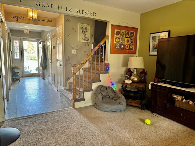 entryway with light carpet