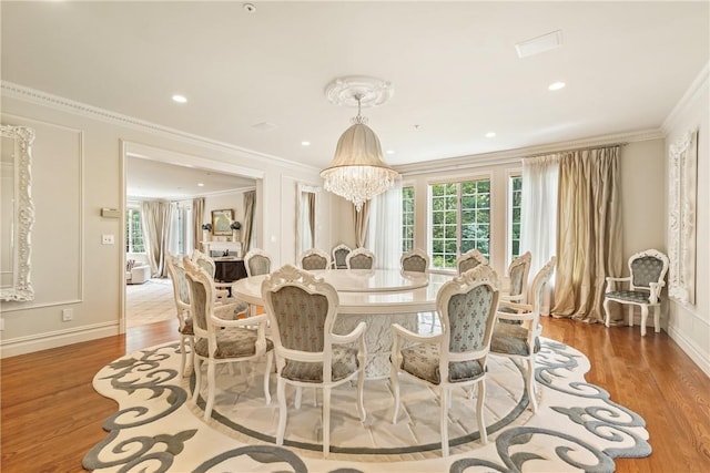 9 Lincoln Woods, Purchase, NY 10577 - dining space with a chandelier, hardwood / wood-style floors, and ornamental molding