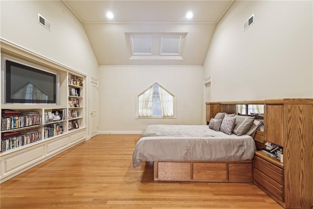 9 Lincoln Woods, Purchase, NY 10577 - bedroom featuring light wood-type flooring, high vaulted ceiling, and crown molding