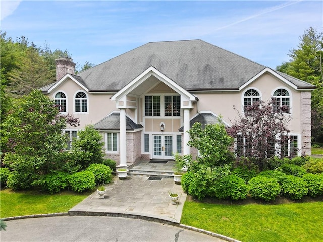 9 Lincoln Woods, Purchase, NY 10577 - view of front of home with french doors