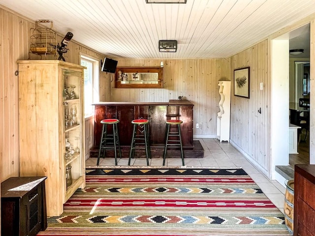 bar with wooden ceiling and wood walls