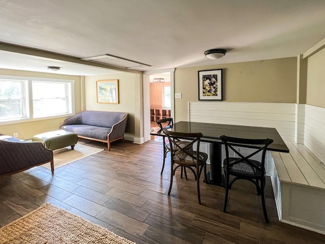 dining area with dark hardwood / wood-style floors