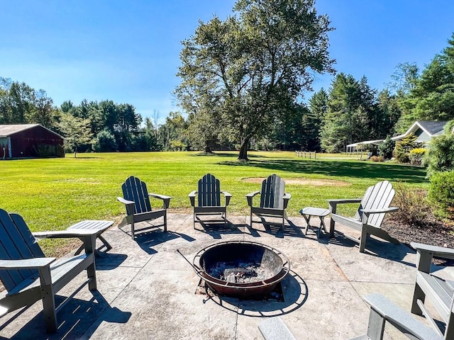 view of patio / terrace featuring a fire pit