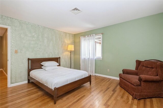 bedroom featuring light hardwood / wood-style flooring