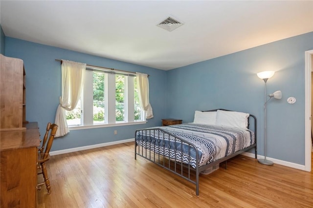 bedroom featuring light wood-type flooring