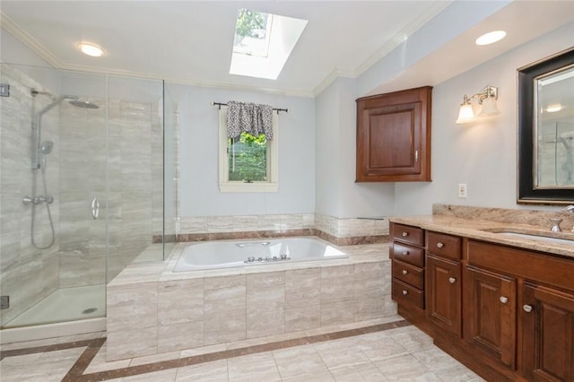 bathroom with vanity, crown molding, plus walk in shower, and a skylight