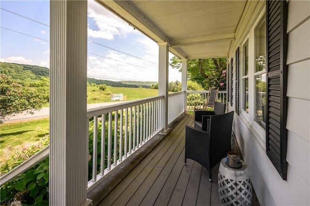 wooden terrace with covered porch