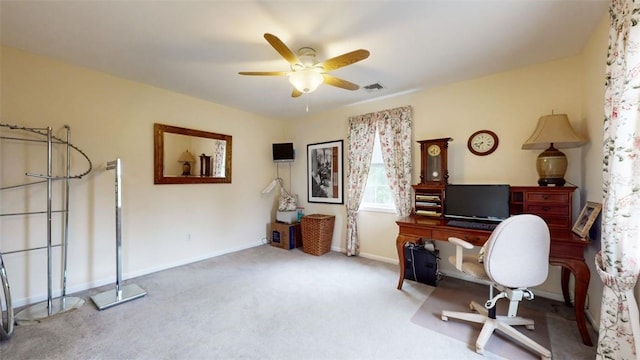 office space featuring ceiling fan and carpet floors