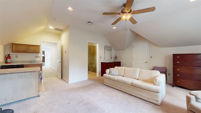 carpeted living room featuring vaulted ceiling and ceiling fan