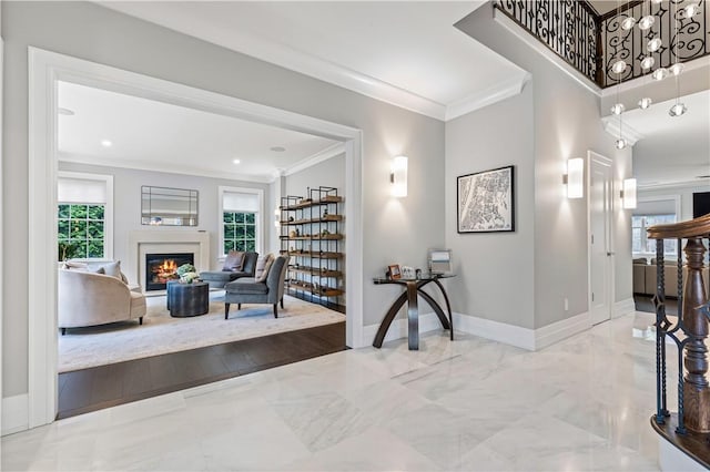 interior space featuring wood-type flooring and ornamental molding