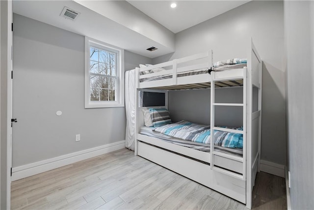 unfurnished bedroom with light hardwood / wood-style floors