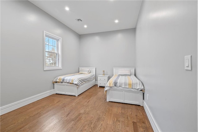 bedroom featuring light wood-type flooring