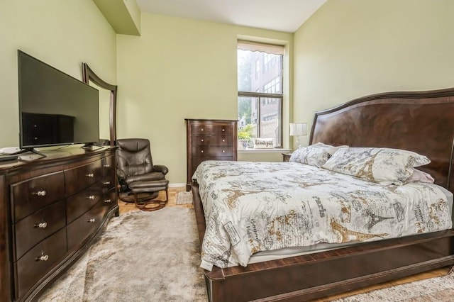 bedroom with lofted ceiling