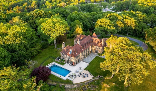 11 Carriage Trl, Tarrytown, NY 10591 - view from above of property with a pool area and a heavily wooded area