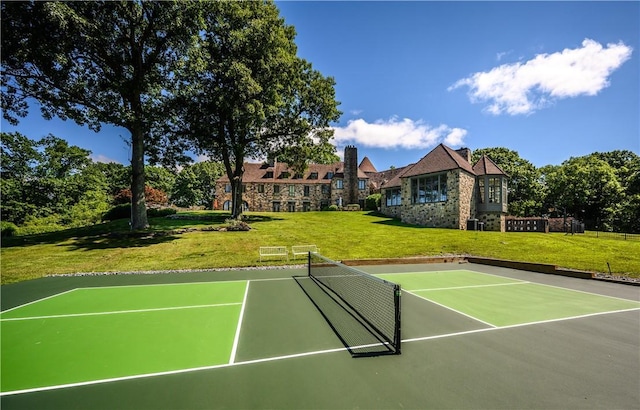 11 Carriage Trl, Tarrytown, NY 10591 - view of tennis court featuring a lawn