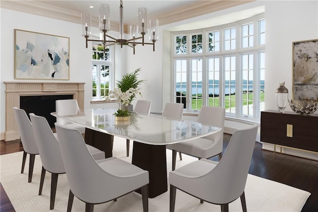 dining area featuring hardwood / wood-style flooring, a water view, crown molding, and a chandelier