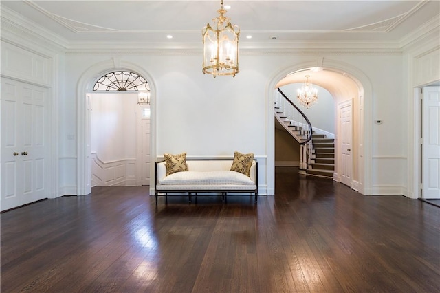 11 Carriage Trl, Tarrytown, NY 10591 - foyer entrance featuring a chandelier, arched walkways, stairs, hardwood / wood-style floors, and ornamental molding