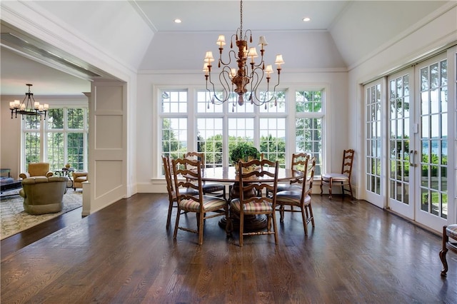 11 Carriage Trl, Tarrytown, NY 10591 - dining area with a chandelier, healthy amount of natural light, french doors, dark wood-style flooring, and lofted ceiling