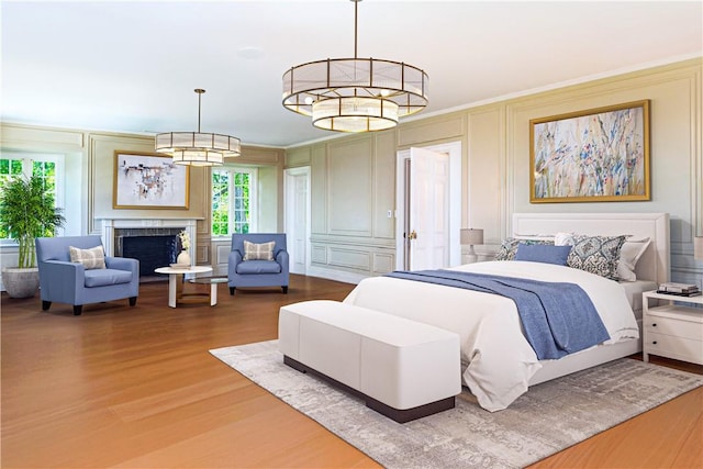 bedroom featuring hardwood / wood-style flooring and a chandelier