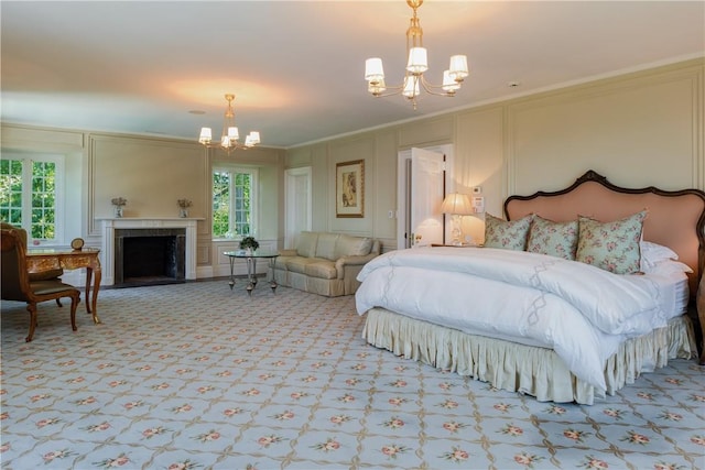 11 Carriage Trl, Tarrytown, NY 10591 - bedroom featuring a chandelier, light colored carpet, a decorative wall, crown molding, and a fireplace