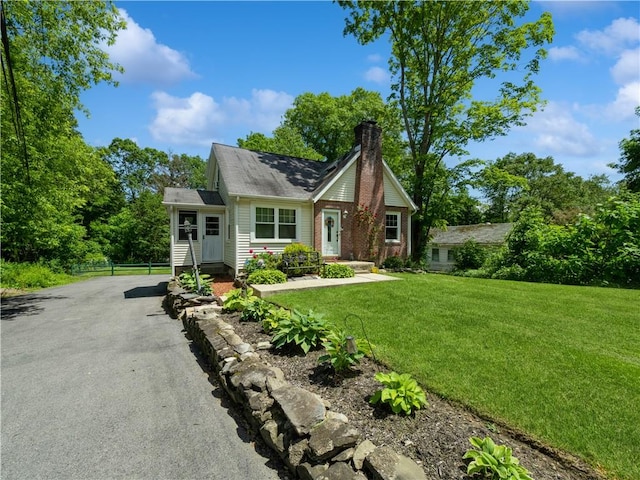 view of front of home with a front yard