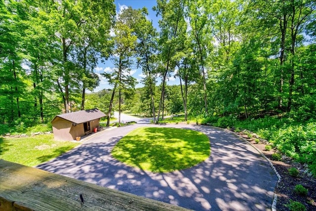 exterior space with a storage shed