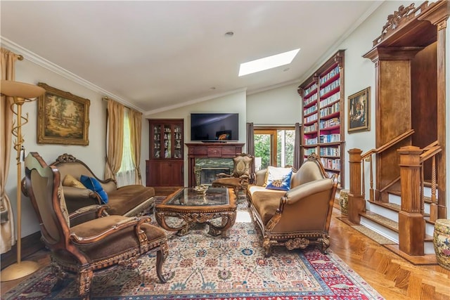 living area with parquet flooring, lofted ceiling with skylight, and ornamental molding