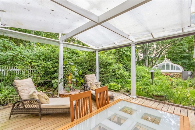 wooden deck featuring central air condition unit